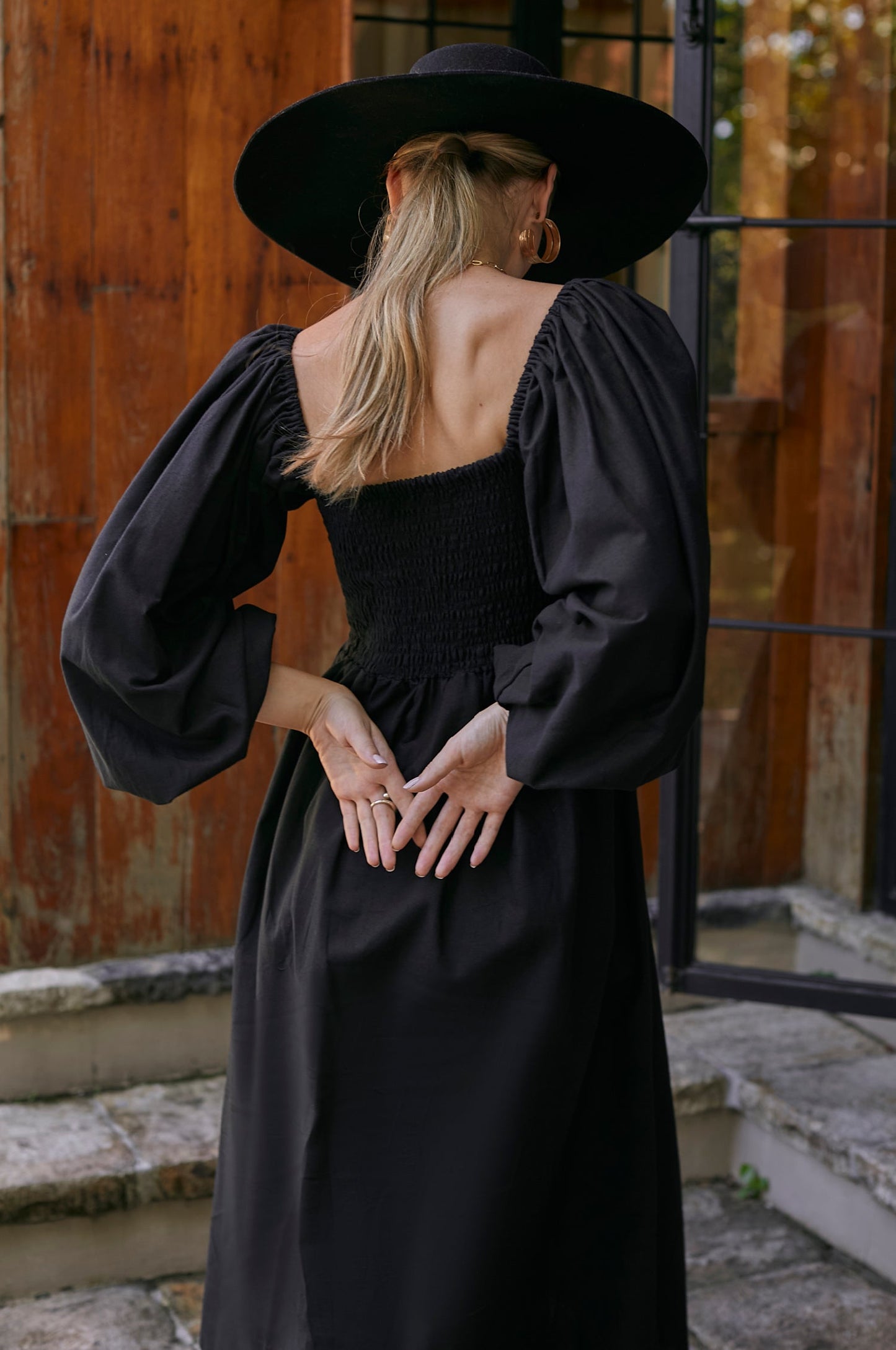 The Alila Smocked Linen Midi Dress