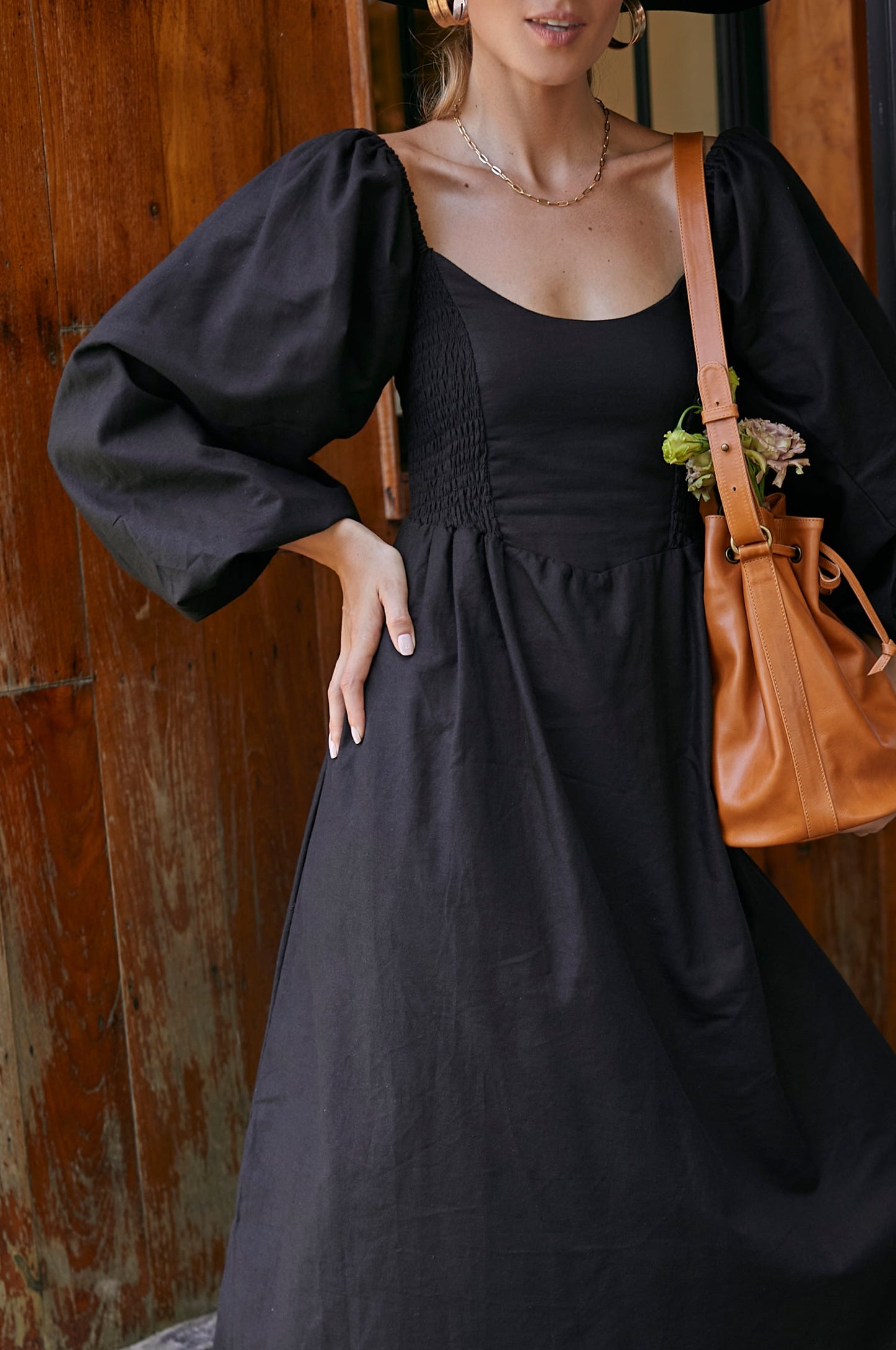 The Alila Smocked Linen Midi Dress